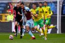Norwich City were forced to battle hard as they held Burnley to a goalless draw at Turf Moor.