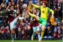 Norwich City recorded their first Premier League point of the season with a goalless draw against Burnley.