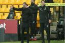 Head Coach Daniel Farke and his assistant Eddie Riemer in perfect sync with their instructions during the win over Nottingham Forest