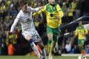 Sam Byram in action for Leeds in April 2015, chasing Norwich City favourite Wes Hoolahan during a 2-0 Championship win at Elland Road for City. Picture: Paul Chesterton/Focus Images