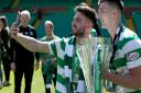 Patrick Roberts takes a selfie with Kieran Tierney as they parade the 2018 Scottish Premiership trophy Picture: PA
