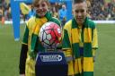 Norwich City regularly celebrate their Community Hero scheme on match days, pictured are former nominees Siggy Sorboen, left, and his friend Joe Fisher Picture: Paul Chesterton/Focus Images