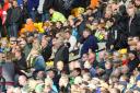 Dejected Norwich fans leave in large numbers before the end of the Barclays Premier League 2-0 loss to Arsenal at Carrow Road, Norwich. Picture by Paul Chesterton/Focus Images Ltd