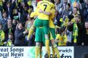 Norwich City players and fans celebrate Elliott Bennett's goal against Reading. Picture: Paul Chesterton / Focus Images