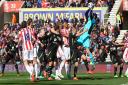Stoke goalkeeper Asmir Begovic collects the ball safely in a crowded penalty area. Picture: Paul Chesterton / Focus Images