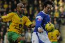 Zesh Rehman, on his Norwich City debut, up against Ipswich Town's Alan Lee