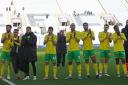 Norwich City players salute the vast travelling support after a 4-2 Championship win at Coventry