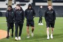City's players enjoy a stroll on the Hull pitch before their 2-1 win over the Tigers