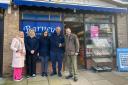 Barney's in Sheringham's town centre will host a Post Office branch. From left are, town clerk Sarah Peberday, employee Caroline Horne, owners Nisha  and Jigen Patel and MP Duncan Baker.