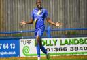 Jamar Loza celebrates after scoring King's Lynn Town's late winner against Woking - the club he has now rejoined