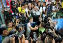 The main man - England's Harry Kane takes a selfie with fans, and a few photographers Picture:PA