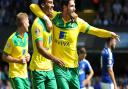 Norwich City's Lewis Grabban (left) celebrates with Kyle Lafferty (right) after scoring against Ipswich Town at Portman Road two years ago. Pic: Nigel French/PA Wire.