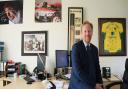 Dan Chapman, senior partner at Full Contact sports agency, in his office with signed photographs and memorabilia of some of his clients.  Picture: DENISE BRADLEY