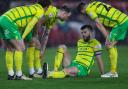 Grant Hanley is absent from Norwich City's matchday squad at Stoke City
