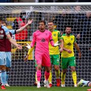 Norwich City number one Tim Krul protests his innocence after colliding with Matej Vydra at Burnley