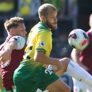 Burnley defender James Tarkowski and Teemu Pukki tussle during Norwich City's 2-0 loss at Turf Moor two years ago