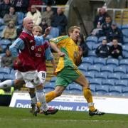 Darren Huckerby slots home goal number five in a remarkable game at Burnley in 2004 - Norwich City need to be prepared for a battle at Turf Moor this weekend