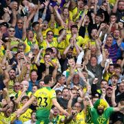 Norwich City fans may need to prove they have been jabbed twice before returning to Carrow Road.