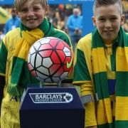 Norwich City regularly celebrate their Community Hero scheme on match days, pictured are former nominees Siggy Sorboen, left, and his friend Joe Fisher Picture: Paul Chesterton/Focus Images