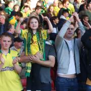 The travelling Norwich fans celebrate victory at the City Ground, Nottingham Picture: Paul Chesterton/Focus Images Ltd