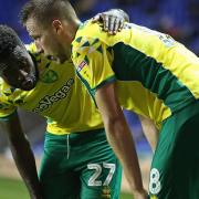 Alex Tettey speaks to Marco Stiepermann - this time after his run created the winning goal at Reading Picture: Paul Chesterton/Focus Images Ltd