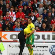 Grant Holt Norwich shares a joke with the Nottingham Forest fans as they 