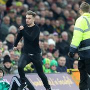 A Notts Forest fan invades the pitch and is ejected by stewards during the Sky Bet Championship match at Carrow Road, NorwichPicture by Paul Chesterton/Focus Images Ltd +44 7904 64026706/03/2018