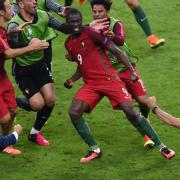 Portugal players celebrate after Eder (centre) scores his side's goal in the final against France. PIC: Joe Giddens/PA Wire.