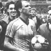 John Deehan claims the match ball after scoring four against Watford in 1984 Picture: Archant Library