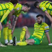 Grant Hanley is absent from Norwich City's matchday squad at Stoke City