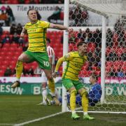 Ashley Barnes celebrates sealing Norwich City's 3-0 Championship win over Stoke City